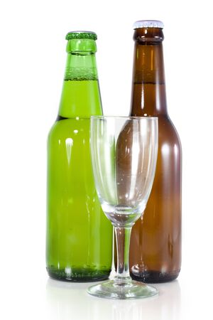 two beer bottles with empty glassの写真素材