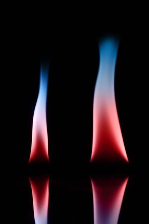 blue and red flame on white backgroundの写真素材
