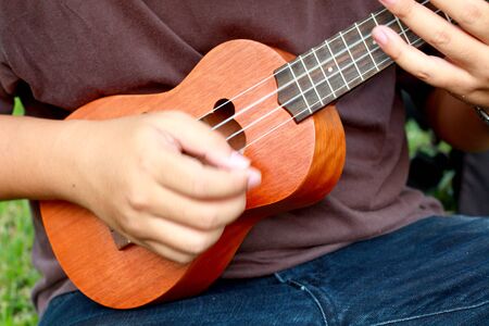 hand playing ukuleleの写真素材