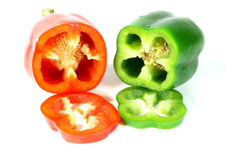 Green and red sweet pepper on white background