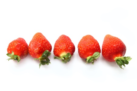 five fresh strawberriesの写真素材