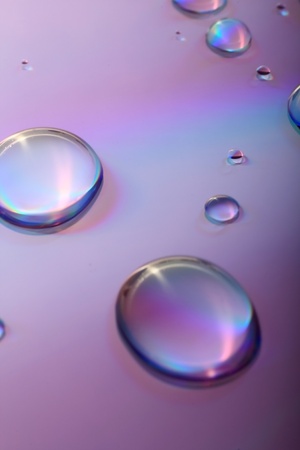 water drops on colorful backgroundの写真素材