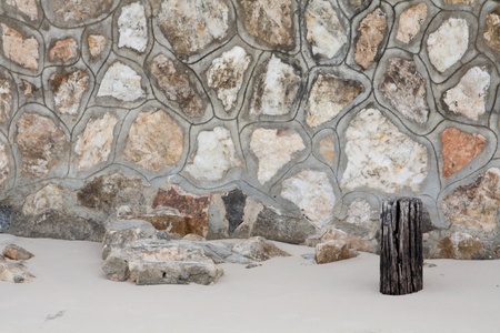 beach sand and stone wallの写真素材