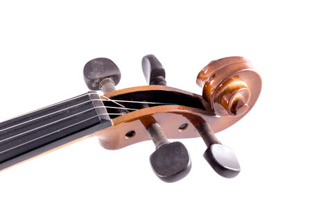 Close-up violin head on white backgroundの写真素材