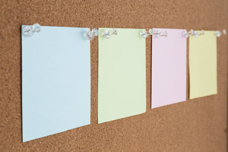 cork board with blank notesの写真素材