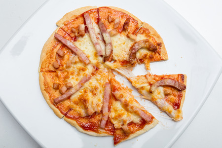 Homemade mixed sausage pizzaの写真素材