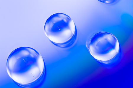 water drops on colorful backgroundの写真素材