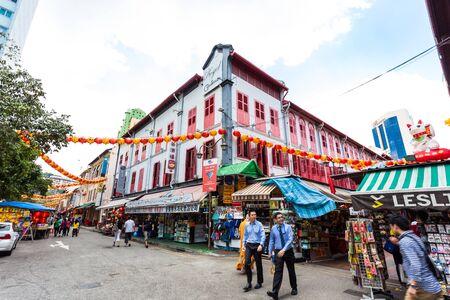 SINGAPORE - FEBRUARY 27, 2015: Shoppers shopping at Singapore's chinatown. Singapore's chinatown is the famous tourist attraction in Singapore.のeditorial素材