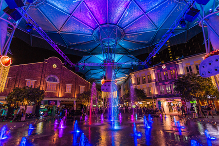 SINGAPORE - FEBRUARY 28, 2015: Night scene of colourful buildings at Clarke Quay. Clarke Quay is a historical riverside quay in Singapore.のeditorial素材