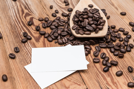 Coffee beans with blank business cardの写真素材