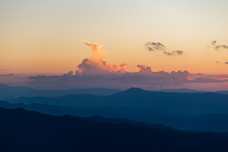 Sunset scene with silhouette mountain at Doi Luang Chiang Dao, Chiang Mai Province, Thailand