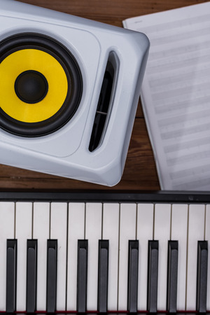 piano, blank music sheet and audio speakerの写真素材