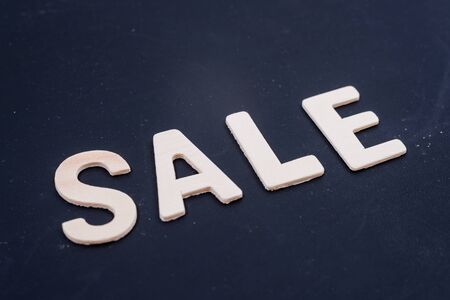 'sale' word on black backgroundの写真素材