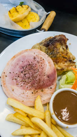 chicken and ham steakの写真素材