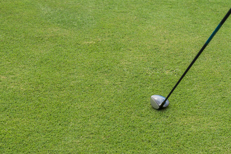 golf club on green grassの写真素材