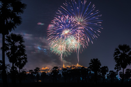 Beautiful firework over Phra Nakhon Khiri hilltop Palace or Khaowang with decorative lighting at Phetchaburi, Thailandの写真素材