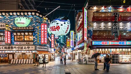 OSAKA, JAPAN - MAY 18, 2018: Night scene of Shin sekai, one of the famous nightlife street in osaka.のeditorial素材