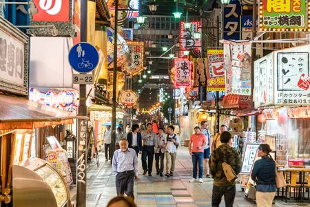 OSAKA, JAPAN - MAY 18, 2018: Night scene of Shin sekai, one of the famous nightlife street in osaka.のeditorial素材