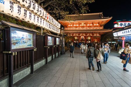 TOKYO, JAPAN - NOVEMBER 14, 2018: Night scene of Sensoji temple with crowded tourist. Sensoji temple is the most famous temple in Asakusa, Tokyo prefecture, Japanのeditorial素材