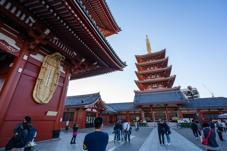 TOKYO, JAPAN - NOVEMBER 14, 2018: Day scene of red pagoda at Sensoji temple. Sensoji temple is the most famous temple in Asakusa, Tokyo prefecture, Japanのeditorial素材