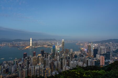 HONG KONG - NOVEMBER 11, 2018: Evening scene of Hong Kong city and Victoria harbour from The Peak.のeditorial素材