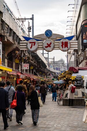 TOKYO, JAPAN - NOVEMBER 19, 2018: Day scene of Crowded people at Ameyoko shopping street, Tokyo prefecture, Japanのeditorial素材