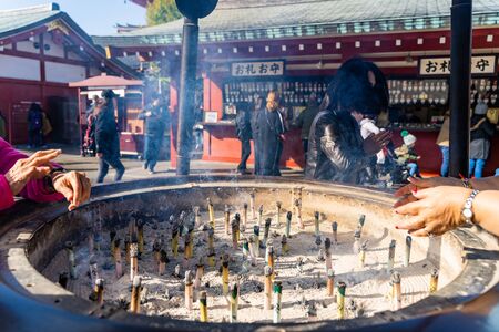 TOKYO, JAPAN - NOVEMBER 20, 2018: Day scene of joss stick pot at Sensoji temple. Sensoji temple is the most famous temple in Asakusa, Tokyo prefecture, Japanのeditorial素材