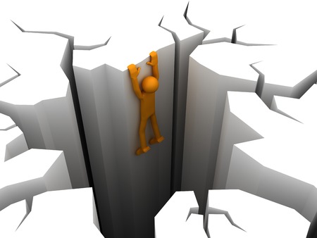 Man is kept so as not to fall into the pitの写真素材