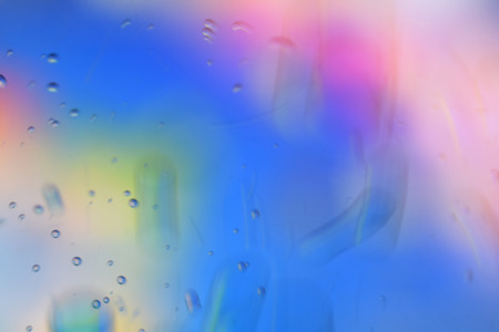 Colorful bubbles blurred for background (blue tone)の写真素材