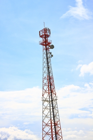 Telecommunication tower on blue skyの写真素材