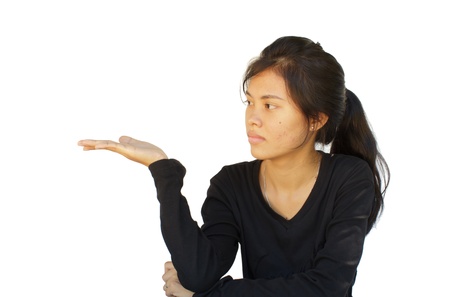 attractive asian young girl showing on white backgroundの写真素材