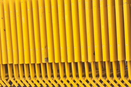 Yellow Folding table made of steel in a rowの写真素材