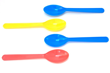 Colorful Spoon plastic isolated on white backgroundの写真素材