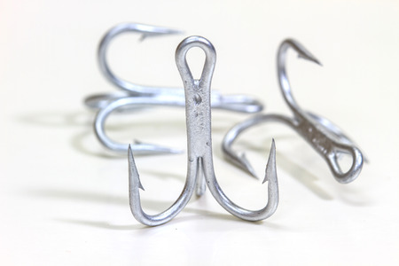 Fishing hook isolated on white background close upの写真素材