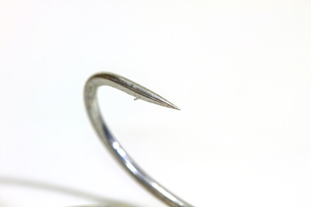 Fishing hook isolated on white background close upの写真素材