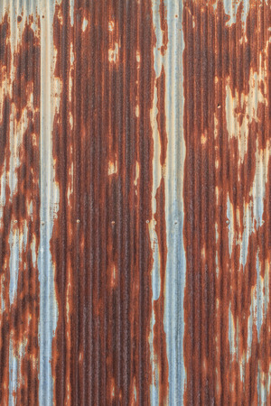 Rusted galvanized iron roof plate, background and texture materialの写真素材