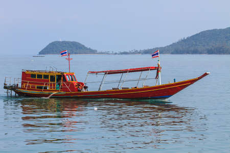 Fishing boat on the sea in summerの写真素材
