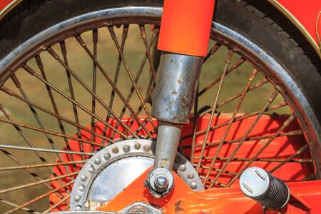 Wheels of motorcycles with tire l close up on the road.