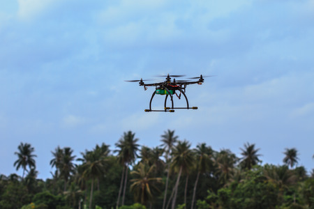 flying drone with camera on the sky