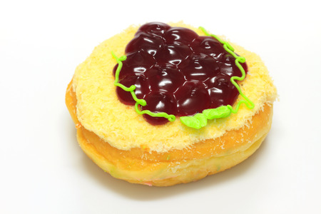 close up delicious Colorful donut on white backgroundの写真素材