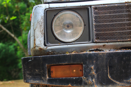 Close up old headlights of car background and textureの写真素材