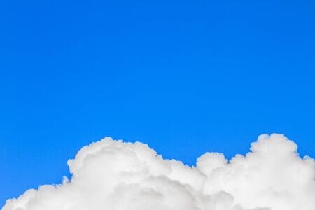 blue sky with white clouds. can be used as backgroundの写真素材