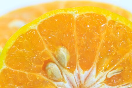 Orange fruit sliced isolated on white backgroundの写真素材