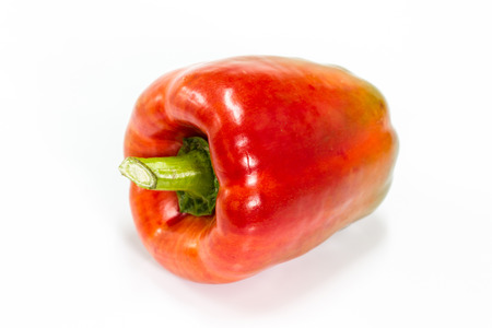 colored peppers over white background, Fresh vegetables sweet Peppers or Bell peppersの写真素材