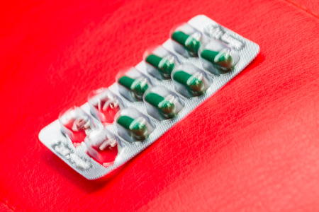 blur of pill and capsule of antibiotics in blister packagingの写真素材