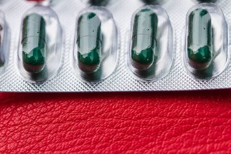 blur of pill and capsule of antibiotics in blister packagingの写真素材
