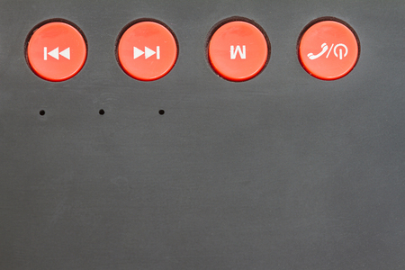 Symbol button on mini wireless loudspeaker closeupの写真素材