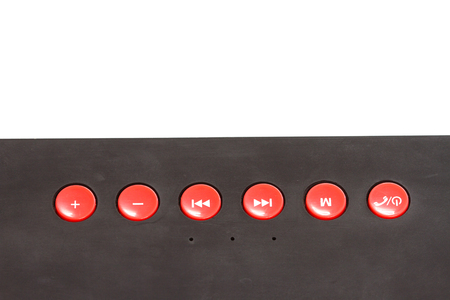 Symbol button on mini wireless loudspeaker closeup