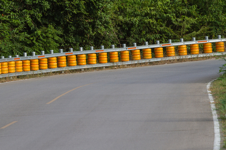 guardrail, is a system designed to keep people or vehicles from straying into dangerous or off-limits areas.の写真素材