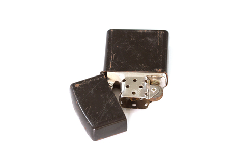 Old Cigarette lighter isolated on white background closeupの写真素材